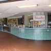 A panorama of the 96th St. concession stand at Rockaway Beach, which features Rockaway Taco, BabyCakes NYC, and Motorboat & the Big Banana.
